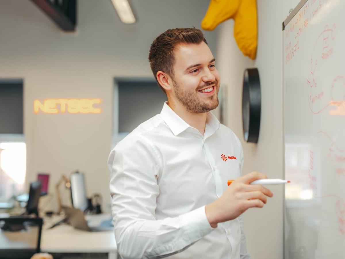 NetSec's Myles Peart Planning Strategy on a Whiteboard